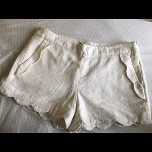 Cute white shorts with a zipper on the side!